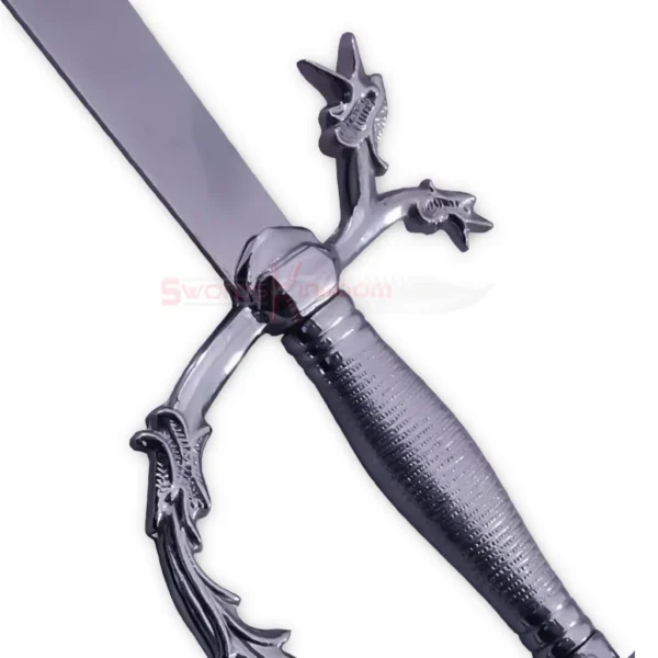 Detailed close-up of the ornate dragon-themed hilt and textured handle of the Arabian Scimitar.