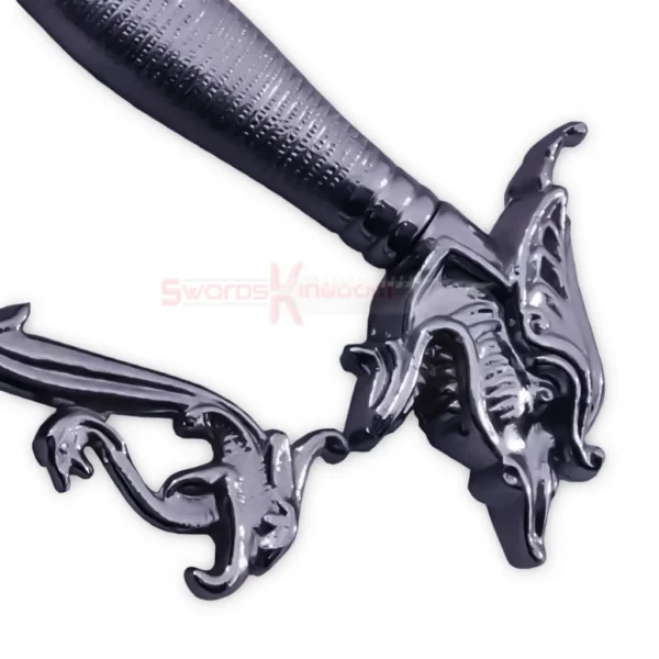 Close-up of the decorative silver crossguard and dark textured grip on the Dragon Scimitar.