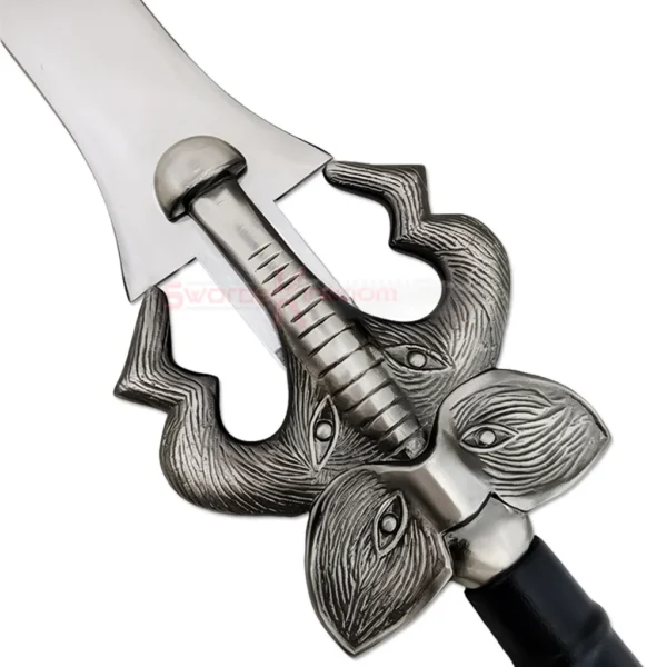 Close-up of the Auron Beast Master Masamune sword showing its ornate silver guard and detailed black handle.
