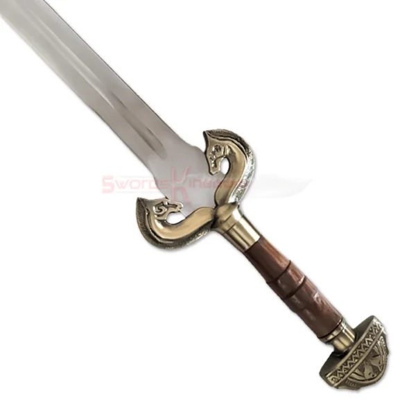 Close-up of the Brown Eowyn sword replica showing the ornate gold swan-shaped guard and brown handle.