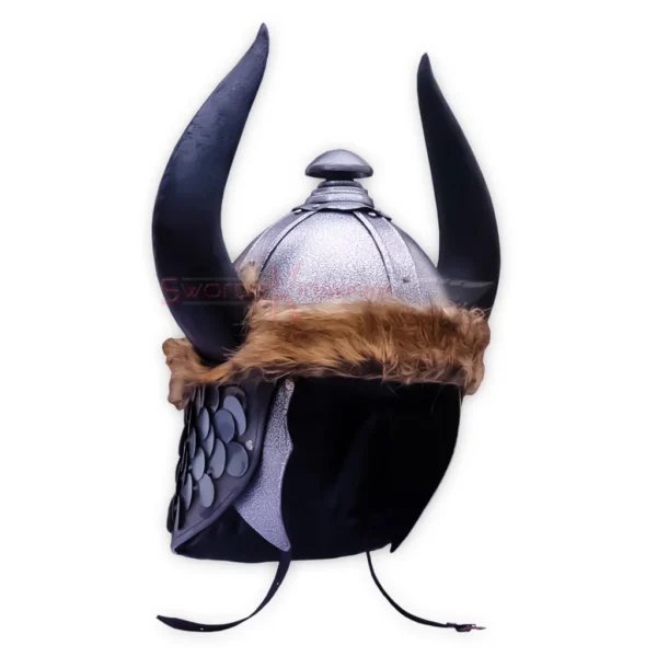 Detailed rear-side view of the Conan the Barbarian Helmet Replica showing the textured silver dome, prominent curved horns, brown fur edging, and decorative scale-style side protection.