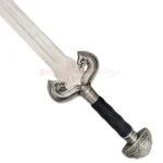 Detailed view of the Éowyn sword replica featuring a black grip and engraved silver pommel.