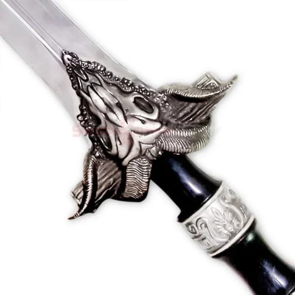 Close-up of the ornate silver handle and black grip on Jason Greek sword replica