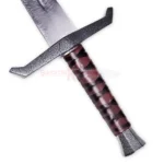 Close-up of the King Arthur Excalibur sword replica showing the textured blade, dark red wrapped grip and rugged metal crossguard.