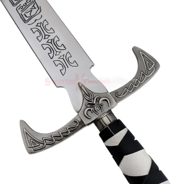 Close-up of the ornate silver crossguard and black-and-white wrapped handle of the Legend of the Seeker Sword of Truth Replica V3.