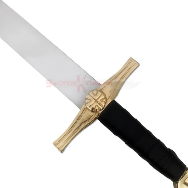 Detailed view of the ornate gold-toned crossguard and black-wrapped handle of the Medieval Knights Templar sword replica.