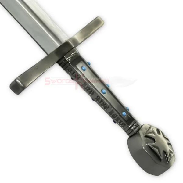 Close-up of Robin Hood sword replica handle with blue accents and decorative pommel