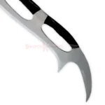 Detailed view of the Klingon Bat'leth replica showing its polished silver finish, curved edges, and central grip opening.