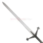 Detailed view of the ornate dark metal crossguard and engraved handle of the Black Knight Claymore sword.