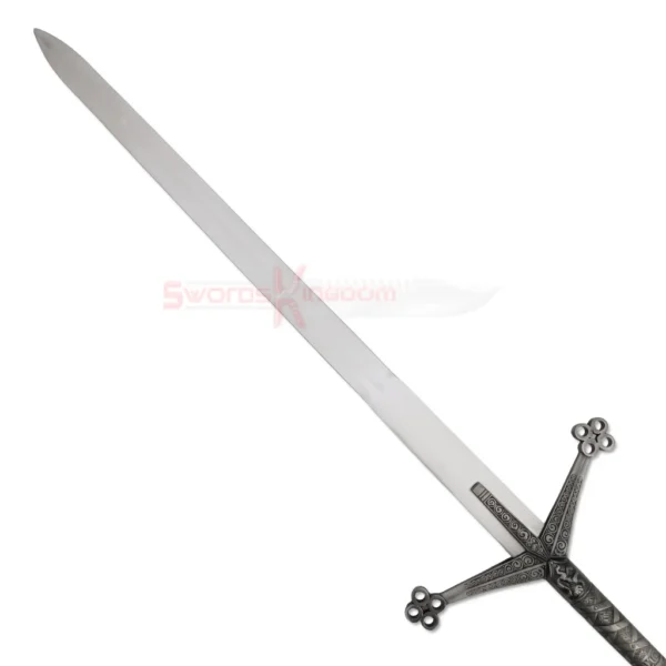 Detailed view of the ornate dark metal crossguard and engraved handle of the Black Knight Claymore sword.