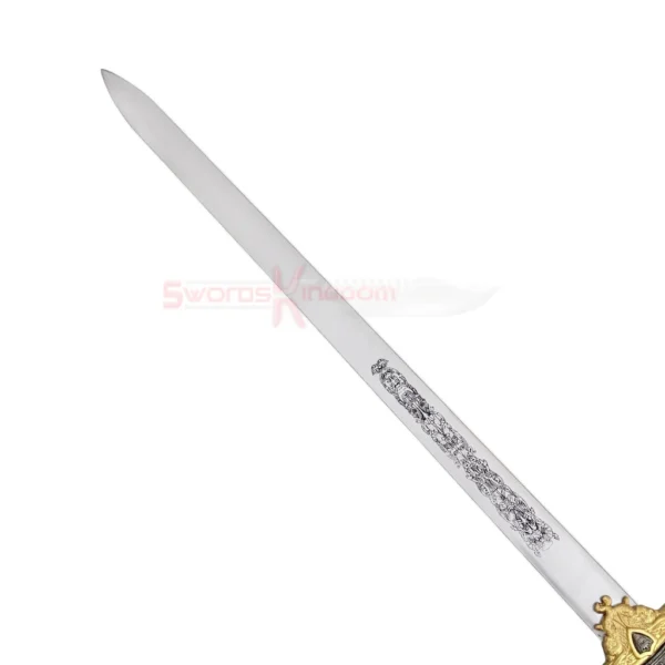 Close-up view of the blade and tip of the King Arthur Excalibur Sword in the Stone Gold Edition replica showing the detailed medieval engraving